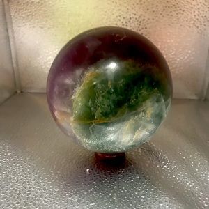 Rainbow flourite sphere 4.37 lbs